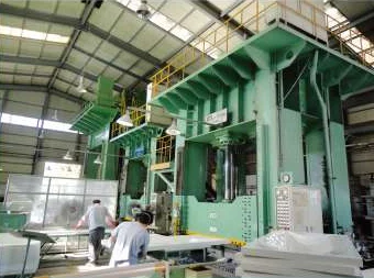Hydraulic hot press used to mould GRP panels in the factory