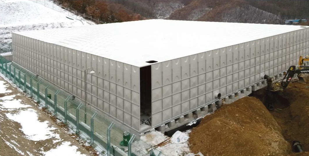 Very large GRP sectional panel tank installed on a hillside site